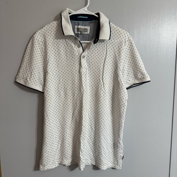 White and Black Patterned Polo Shirt - Picture 1 of 9